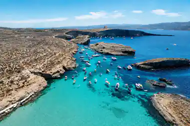 Aerial of the lagoon crowded with boats