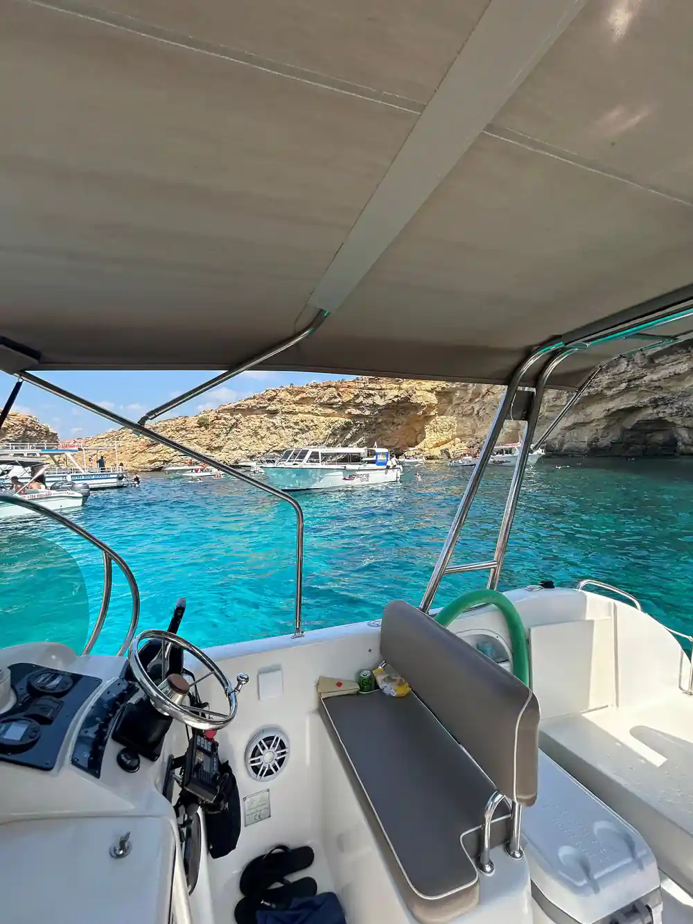 Boats in the lagoon seen from under the canopy