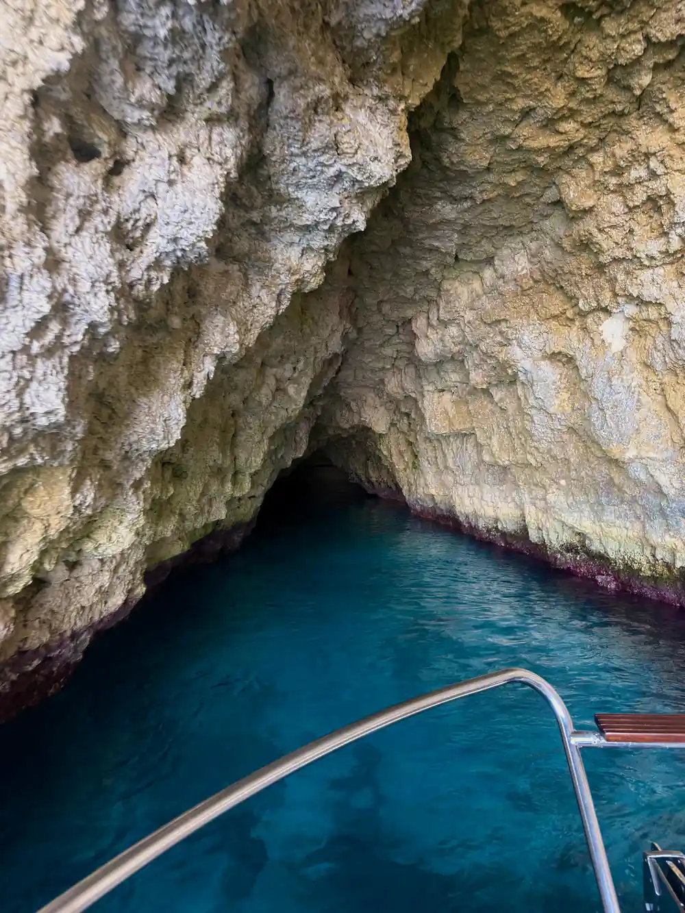 A cave entrance beside the boarding ladder