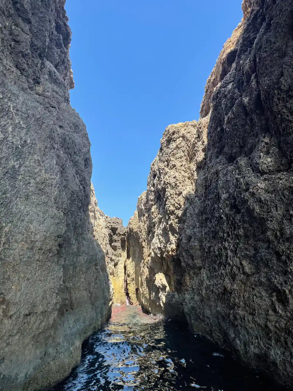 A narrow channel between two rock walls